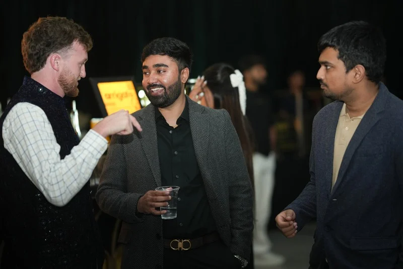 Guests in conversation at a corporate evening at Samsara