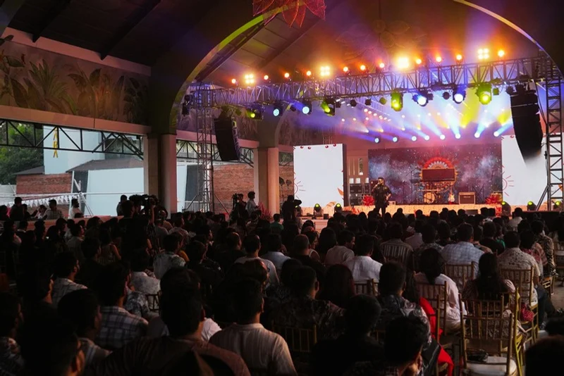 A full audience inside Padma Pavilion during a corporate evening