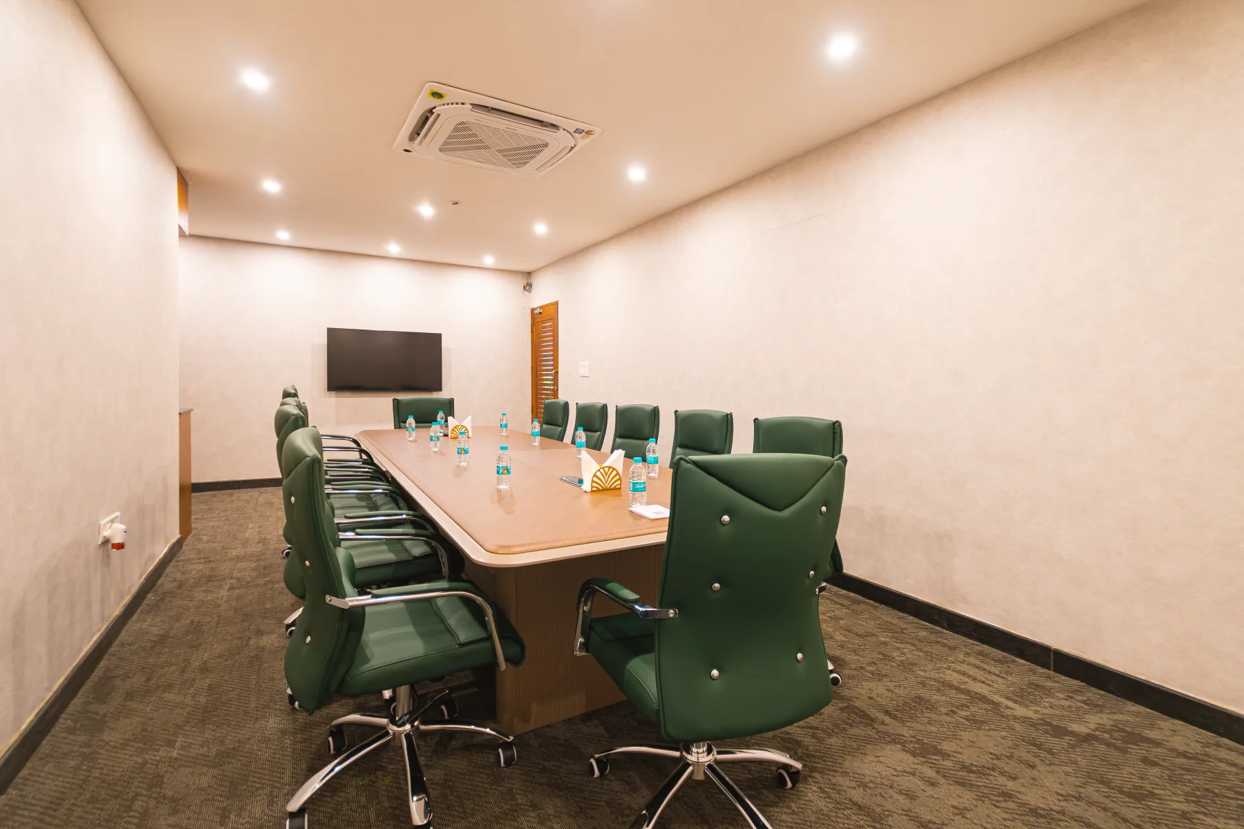 The boardroom with its executive table and presentation screen