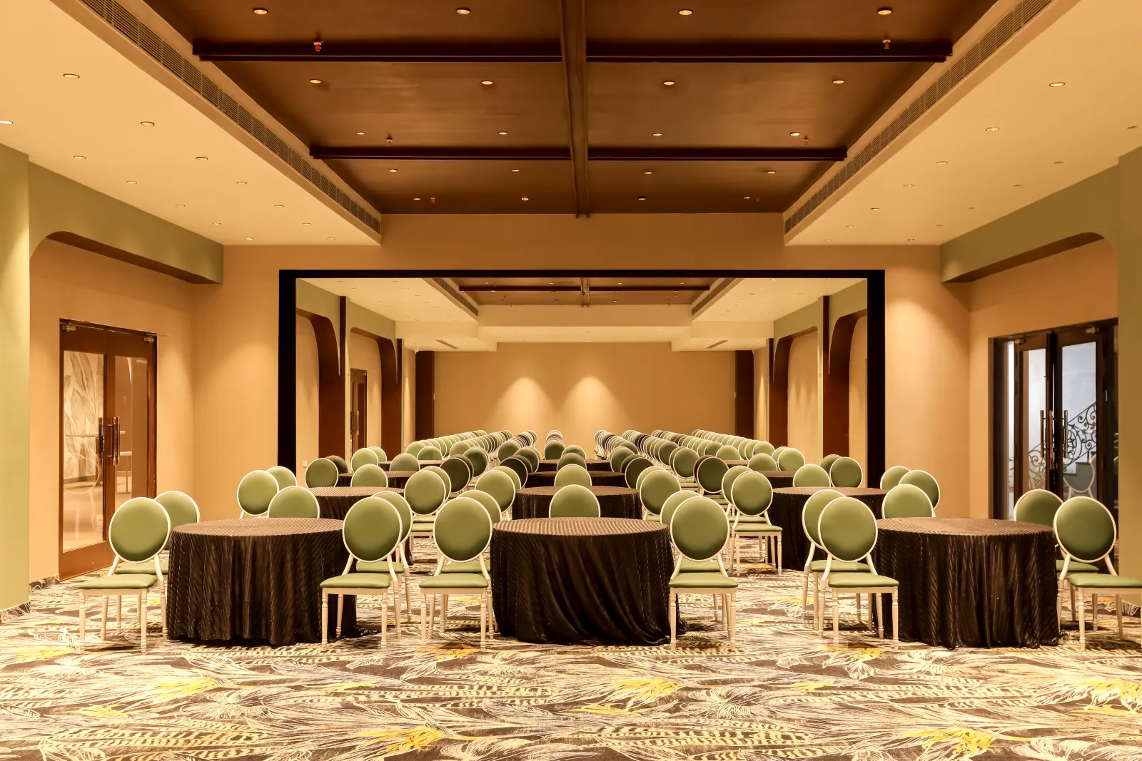 Round-table seating inside Savaya for a corporate dinner