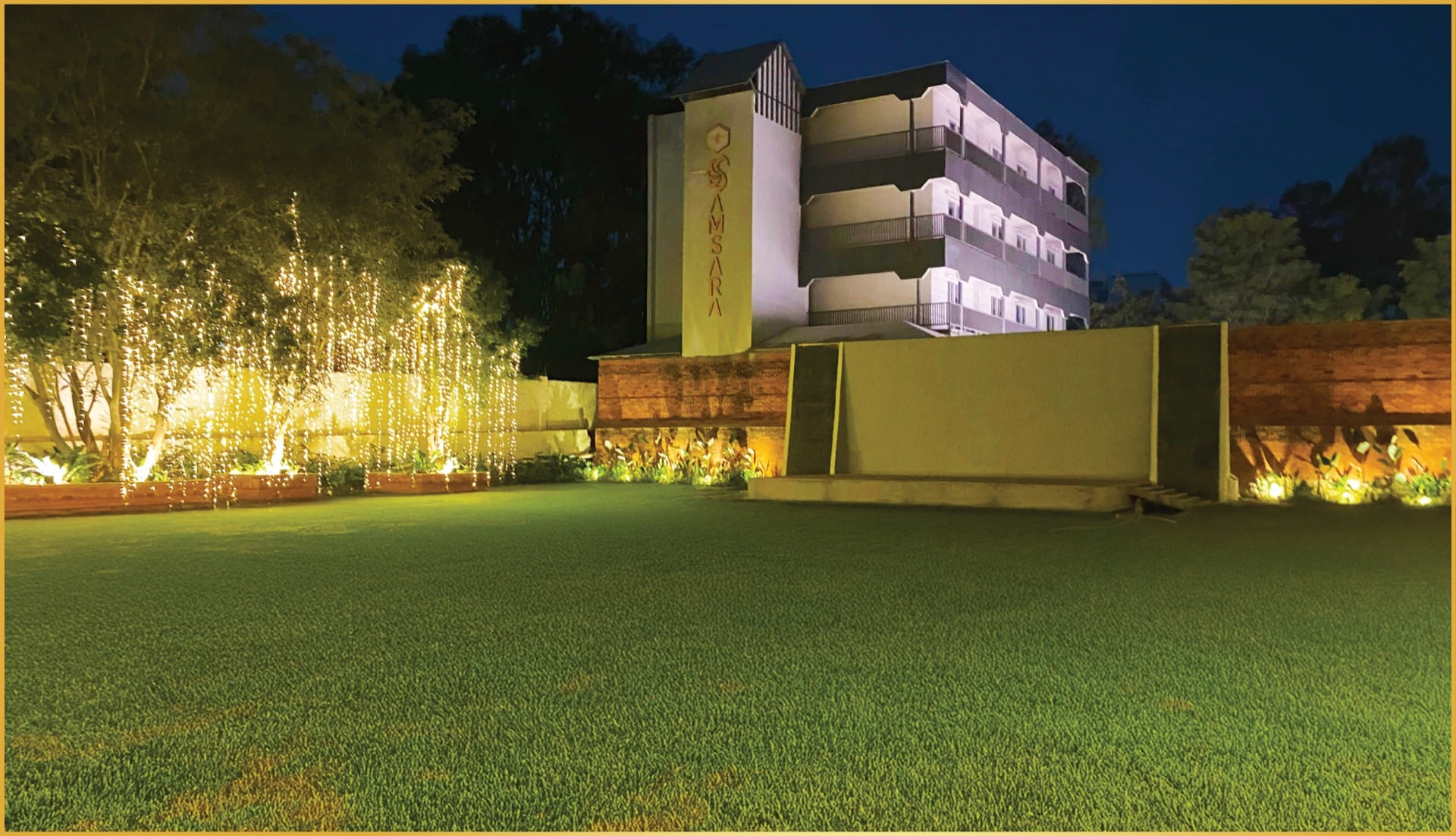 Padma Lawns under fairy lights at night