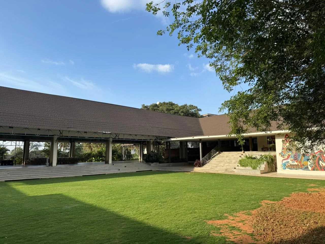 Padma Lawns in daylight with the pavilion alongside