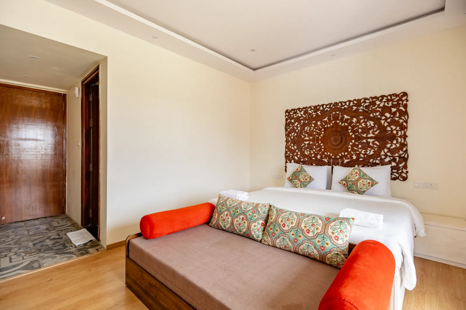 A Rumah Residence with bed and lounge seating